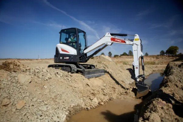 Bobcat E35 mini excavator trenching