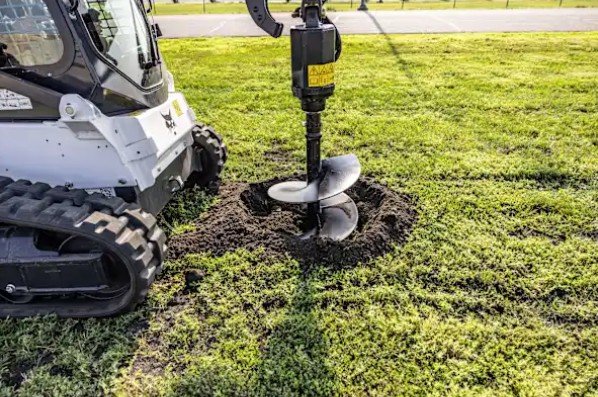 Auger attachment drilling post hole