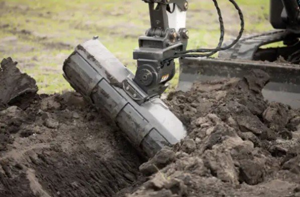 Power tilt tiller attachment